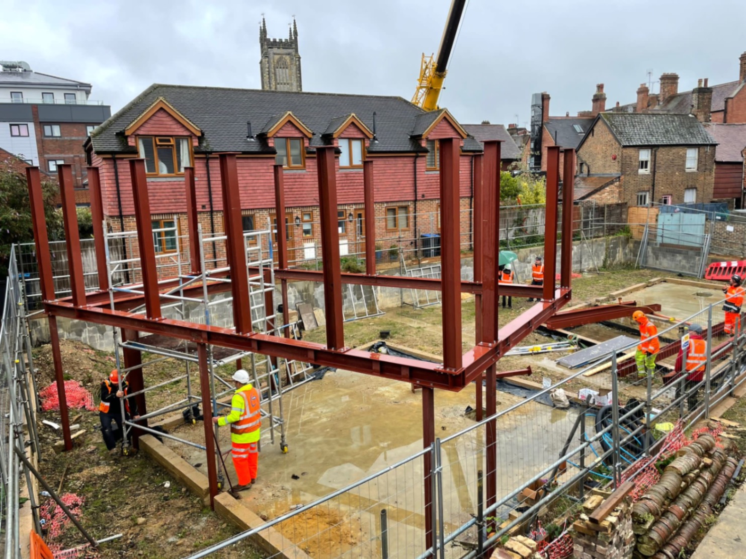 Betsa builders reviewing plans